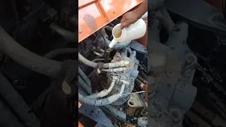 Tata Hitachi super Plus 200 swing motor oil change karte hue