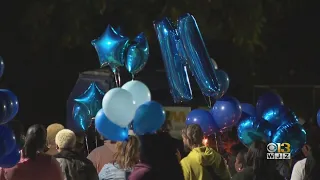 Family and friends of Parkville gunshot victim hold candlelight vigil for him in Baltimore County