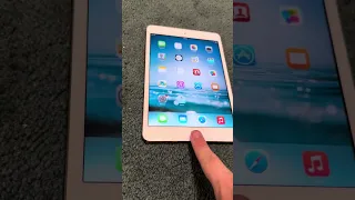 iPad mini 3 that’s running its original iOS 8.0