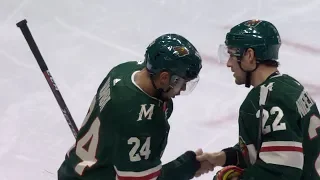 Matt Dumba shakes Niederreiter's hand after scoring on the power play