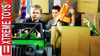 Nerf Gun Cardboard Box Battle! Cole Attacks Ethan with Nerf Guns for Stealing His Dinosaur Toy!