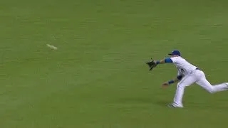 CLE@TOR: Bautista dives to rob Sands of a base hit