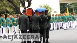 Philippines former leader Marcos buried with honours