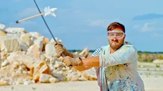 Slicing an Arrow in Half Mid-Air in Slow Motion - The Slow Mo Guys