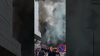 Thick smoke rises above Milan after explosion injures one