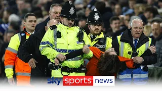 Protester ties himself to a goal post at Goodison Park delaying Everton vs Newcastle game