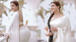 Honey Rose's stunning appearance in a white dhawani set has led to viral photoshoot photos.