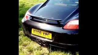 Porsche Cayman S with aftermarket custom exhaust (straight pipes) revving