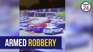 WATCH: Woman robbed at gunpoint outside Midrand shopping centre