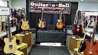 Guitar- o - Sell  Revolving Motorized Guitar Display Stand  757.423.3037