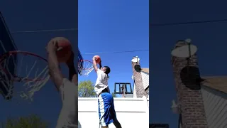 Dunking in my new basketball hoop