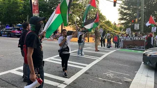 Pro-Palestine protesters march in Midtown Atlanta