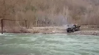 Truck Ural 4320 6X6 runs river