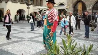 Jones harrassed by a street clown in Prague