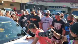 Manny Pacquiao signing a Tesla