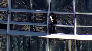 "Pro-life Spiderman" climbs San Francisco building