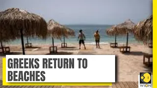 Greeks return to beaches in heatwave | Greece News | Coronavirus News