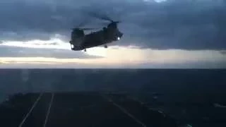 chinook practicing hovering over hms bulwark