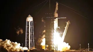 SpaceX launches four astronauts to ISS in new era for Nasa