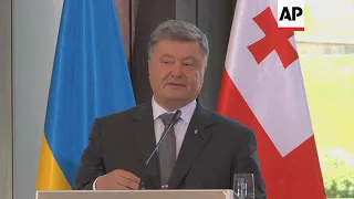 Poroshenko wants to retake Donbass, Crimea