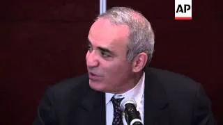 Kasparov says Russian President Putin should be forced to play by the rules; compares him to Hitler