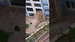 Flood waters gush through Ankara building