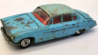 Corgi restoration of Jaguar MK 10 No. 238. Toy, molded model. Adding a suitcase to the trunk.