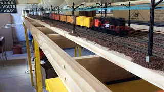 RS-11 leads New Haven local freight under the wires