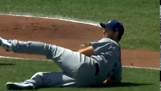 Clayton Kershaw makes an athletic sliding play