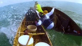 Huge bull shark repeatedly attacks fishermen in canoe