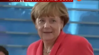 The German Chancellor,Angela Merkel Received The lamp Of Peace