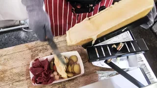 Swiss Raclette of Melted Cheese Tasted in London. World Street food