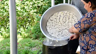 Cooking Delicious Dish "Surhullu" Made of Dough and Meat