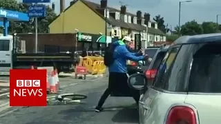 Cyclist and driver filmed fighting