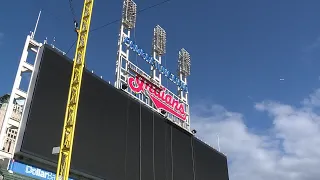 Crews begin to remove the Indians script sign from Progressive Field