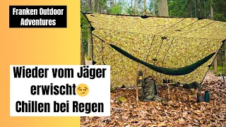 Taglager bei Schlechtwetter, Trotz Regen entspannt chillen in der Hängematte, Begegnung mit Jäger