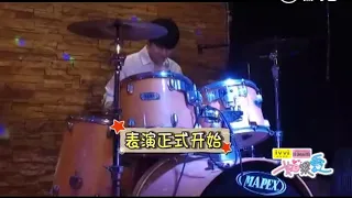 Heechul playing drums