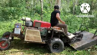 uji coba mower generasi terbaru/ mesin penmbersih kebun.