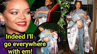 Rihanna shows off baby bump and pregnancy glow while carrying son RZA in her arms