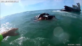 Dramatic video shows deputy rescue man thrown from jet ski