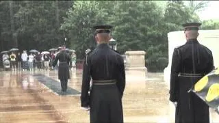 changing of the guard at tomb of unknown during thunder storm.