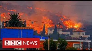 La Palma volcano engulfs village minutes after residents flee their homes - BBC News