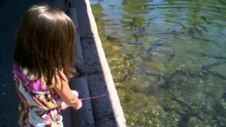 Catches a Trout with her Barbie Fishing Pole (1)