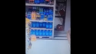 Bottle falls of the shelf but shoots itself back immediately