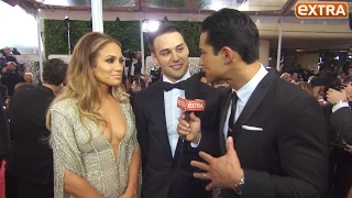 Jennifer Lopez Stuns in Silver Gown at Golden Globes, Talks 'Boy Next Door'