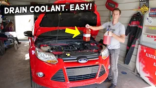 FORD FOCUS MK3 COOLANT RADIATOR FLUSH. RADIATOR DRAIN PLUG LOCATION