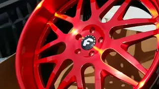 Brushed red Forgiato Kato wheels ready for pickup