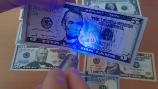 How Dollar Banknotes Look like under UV light
