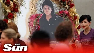 Michael Jackson fans sing, sob, leave sunflowers and roses on 10th anniversary