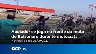 Apoiador se joga na frente da moto de Bolsonaro durante motociata